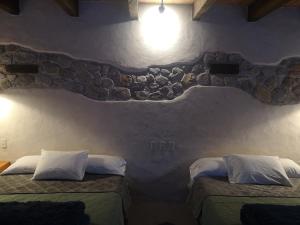 Postel nebo postele na pokoji v ubytování Hotel Pepen
