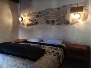 Postel nebo postele na pokoji v ubytování Hotel Pepen