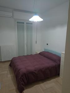 Ліжко або ліжка в номері Appartamento sul Corso