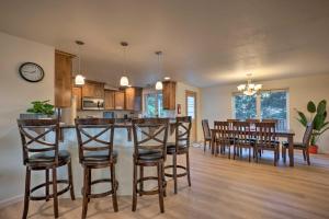 a kitchen and dining room with a table and chairs at Spacious Bandon Getaway - 2 Blocks to Ocean! in Bandon