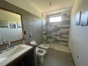 Koupelna v ubytování Casa Sierras de Córdoba Villa el Diquecito + 20 fotografií