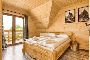 Tempat tidur dalam kamar di GliczarowSKI