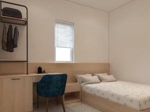 Postel nebo postele na pokoji v ubytování Thiên Thanh Hotel