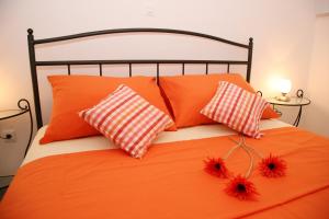 Ein Bett oder Betten in einem Zimmer der Unterkunft Apartments Bašić