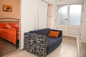 Ein Sitzbereich in der Unterkunft Apartments Bašić