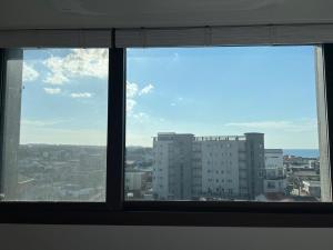 Nespecifikovaný výhled na destinaci Čedžu nebo výhled na město při pohledu z hotelu