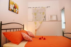 Ein Bett oder Betten in einem Zimmer der Unterkunft Apartments Bašić