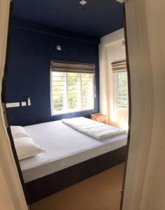 Postel nebo postele na pokoji v ubytování Royal residency