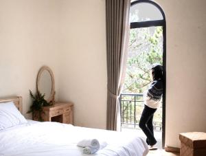 Giường trong phòng chung tại Gia An - hotel in Dalat