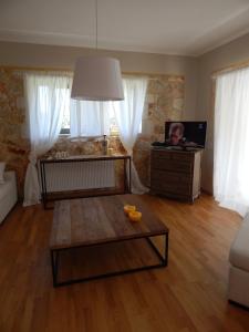 A television and/or entertainment centre at Villa Unique