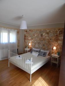 A bed or beds in a room at Villa Unique