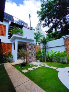 Zahrada ubytování Villa HOMEY Lombok