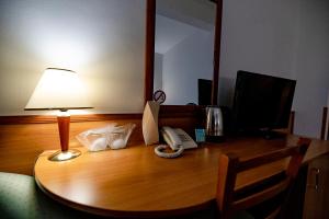 TV a/nebo společenská místnost v ubytování Hotel Rivulus
