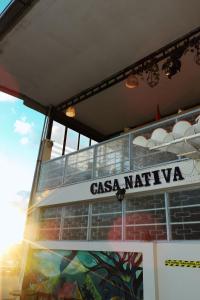 a boat with a sign that reads casa marina at Casa Nativa Iquitos in Iquitos