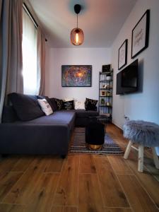 Posedenie v ubytovaní Centrally located 3 Bedroom Holiday House O'Live with private garden