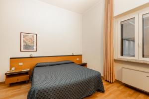 Cama o camas de una habitación en Hotel Nuova Grosseto