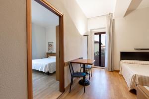Cama o camas de una habitación en Hotel Nuova Grosseto