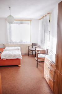 Postel nebo postele na pokoji v ubytování Chalupa Bob a Bobek + 15 fotografií