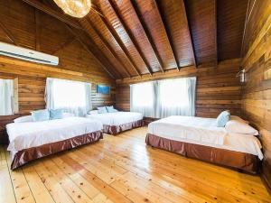 Postel nebo postele na pokoji v ubytování Kentington Resort