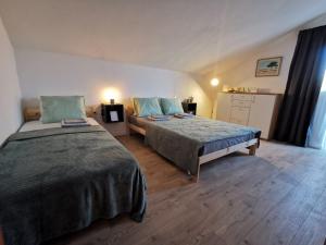 Posteľ alebo postele v izbe v ubytovaní Centrally located 3 Bedroom Holiday House O'Live with private garden