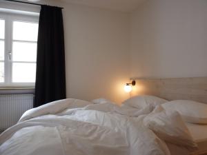 Posteľ alebo postele v izbe v ubytovaní Stern B&B & Suite Apartments