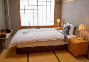 T Square Hakuba客房内的一张或多张床位