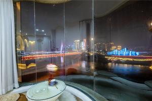 Mynd úr myndasafni af Baihong Riverview Apartment-Hongya Cave í Chongqing