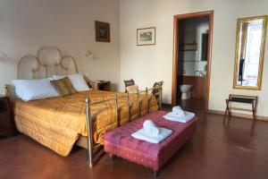 Postel nebo postele na pokoji v ubytování Relais Accademia