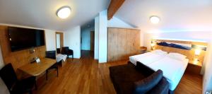 Ein Bett oder Betten in einem Zimmer der Unterkunft Gästehaus Gritscher