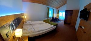 Ein Bett oder Betten in einem Zimmer der Unterkunft Gästehaus Gritscher