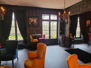 Posezení v ubytování Le Chalet Montégut