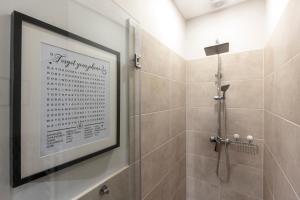 Kúpeľňa v ubytovaní E12 Boutique Apartments