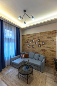 Posedenie v ubytovaní E12 Boutique Apartments