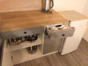 Kuchyňa alebo kuchynka v ubytovaní Turistický apartmánový domček Runina 11