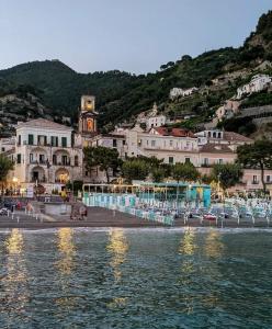 a view of a town from the water at Serenis Luxury Apartments in Minori
