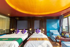 Postel nebo postele na pokoji v ubytování Sapa House Hotel Halal Certified
