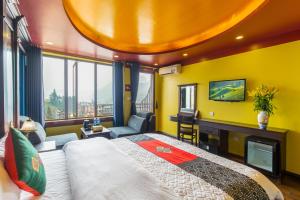 Postel nebo postele na pokoji v ubytování Sapa House Hotel Halal Certified