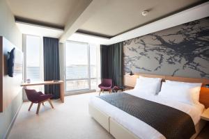 Postel nebo postele na pokoji v ubytování Hotel Dubrovnik Palace