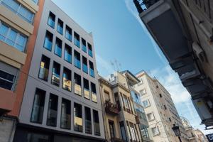 a group of buildings in a city at BN SUITES Teatro in Alicante