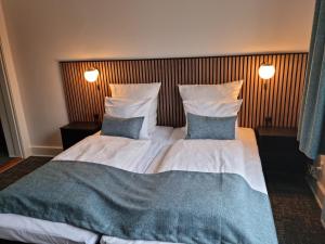 Hotel Phønix Hjørring 객실 침대
