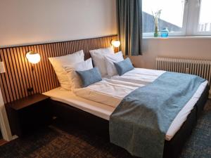 Hotel Phønix Hjørring 객실 침대