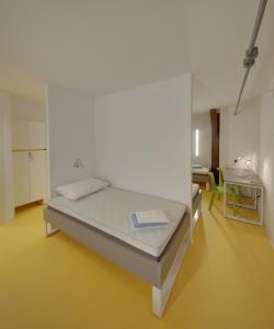 Posteľ alebo postele v izbe v ubytovaní Hi Hostel Stara Pekara Osijek