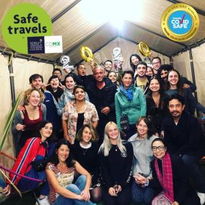 a group of people posing for a picture at Casa Eufemia Hostel type in Mexico City