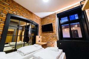 Posteľ alebo postele v izbe v ubytovaní Lord Jack Apartments