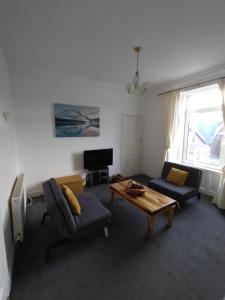Posezení v ubytování Apartment in the heart of Callander