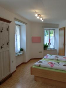 Voodi või voodid majutusasutuse Ferienhaus Berkele für 8 bis 12 Personen toas