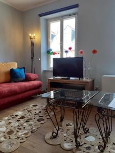Μια τηλεόραση ή/και κέντρο ψυχαγωγίας στο Ferienhaus Berkele für 8 bis 12 Personen