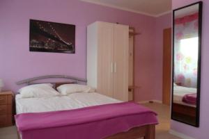 Postel nebo postele na pokoji v ubytování Gästezimmer Vogelsberg
