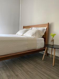 a bedroom with a bed and a table at Precious Studio w/ working station in Playa del Carmen