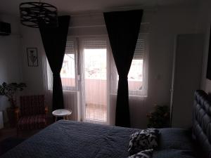 Postel nebo postele na pokoji v ubytování Apartman_Park